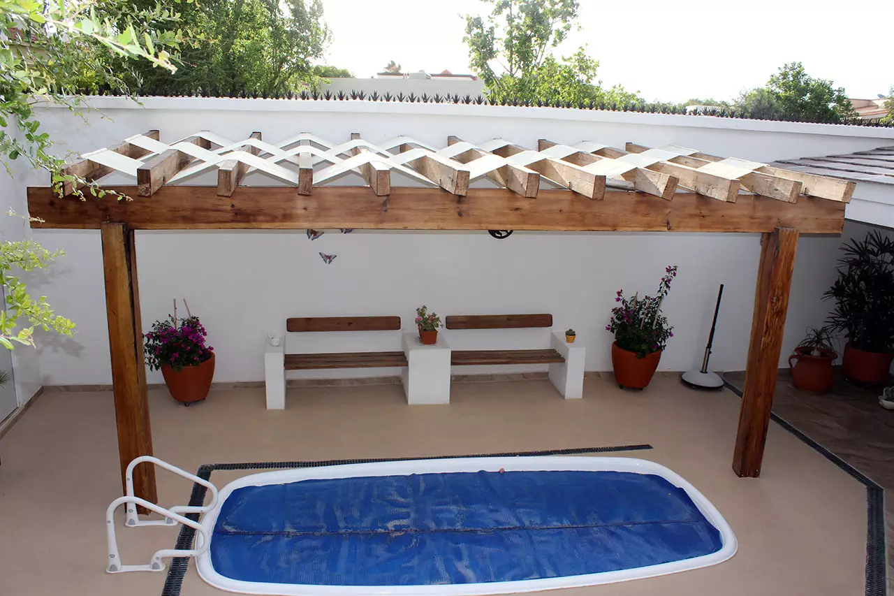 P&eacute;rgola con malla sombra